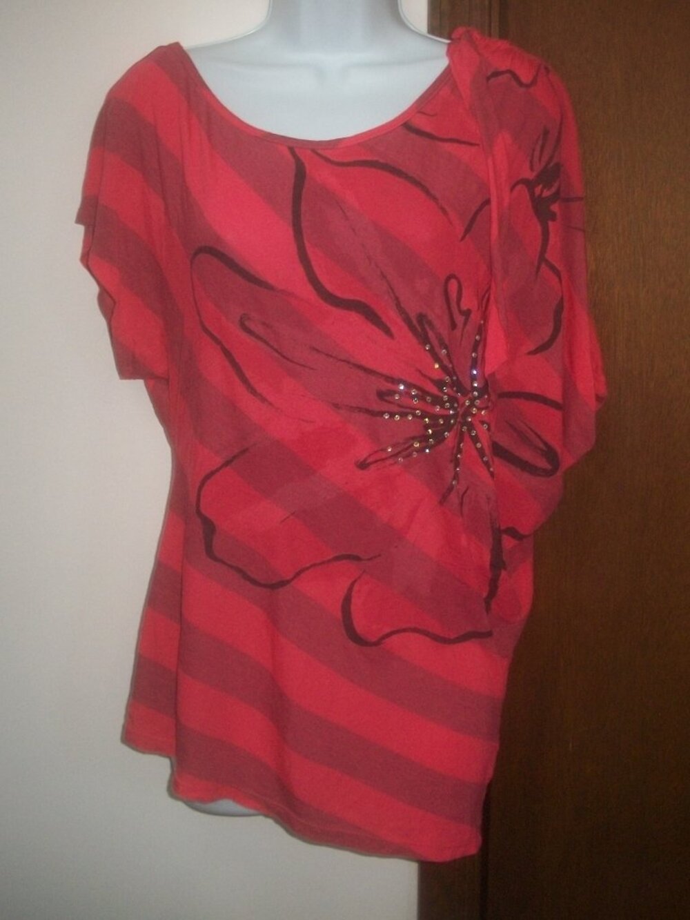 womens asymetrical top.striped.floral bling. hi-low. size medium